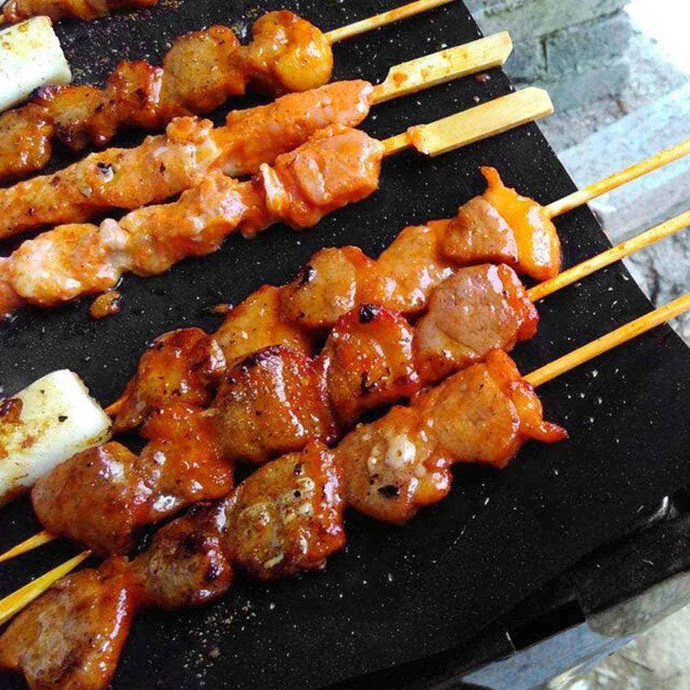 Upgrade your outdoor cooking with this reusable non-stick BBQ grill mat that keeps every dish intact, prevents messes, and makes cleanup quick, so you can focus on flavor, social grilling moments, and total outdoor enjoyment.