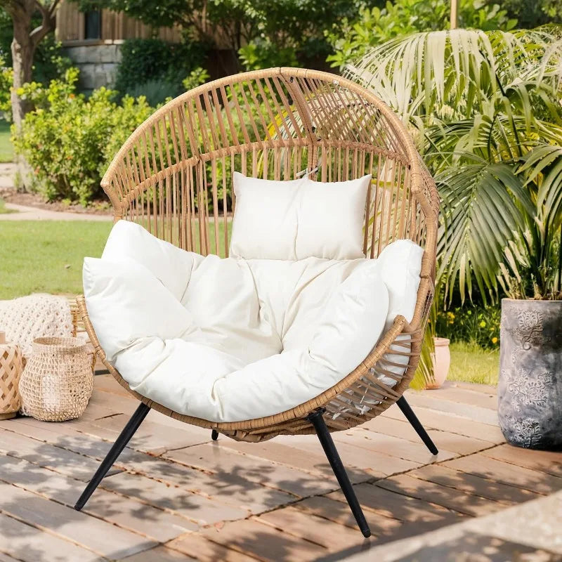 Transform your outdoor space with this plush PE rattan egg chair that blends style and comfort.