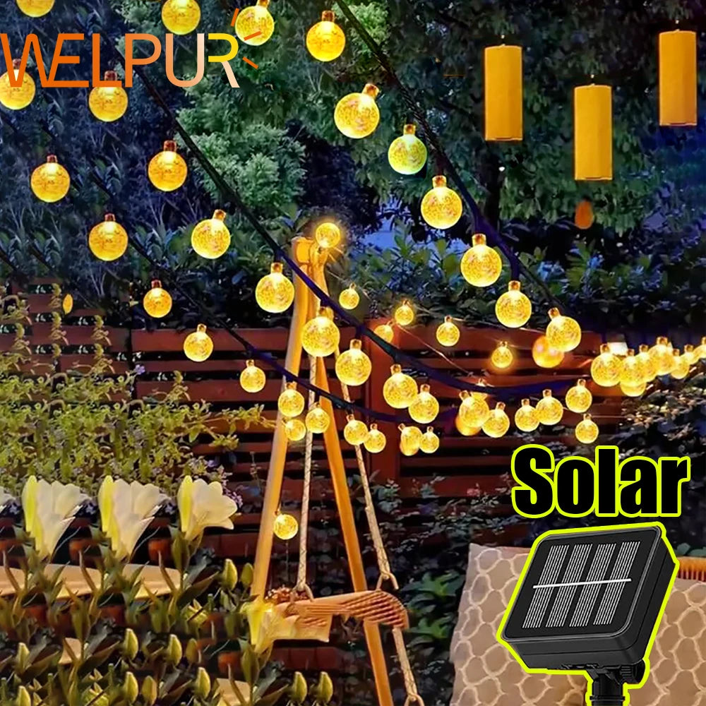 Illuminate your outdoor spaces with the enchanting glow of WELPUR Solar Bubble Ball String Lights.