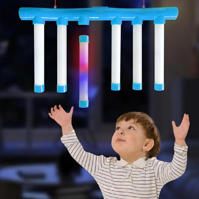 You’ll electrify game night with the Reflex Challenge Glow In The Dark Falling Sticks Catch Game.