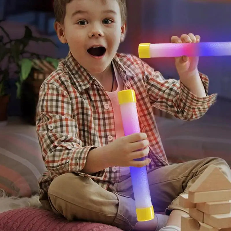 You’ll electrify game night with the Reflex Challenge Glow In The Dark Falling Sticks Catch Game.
