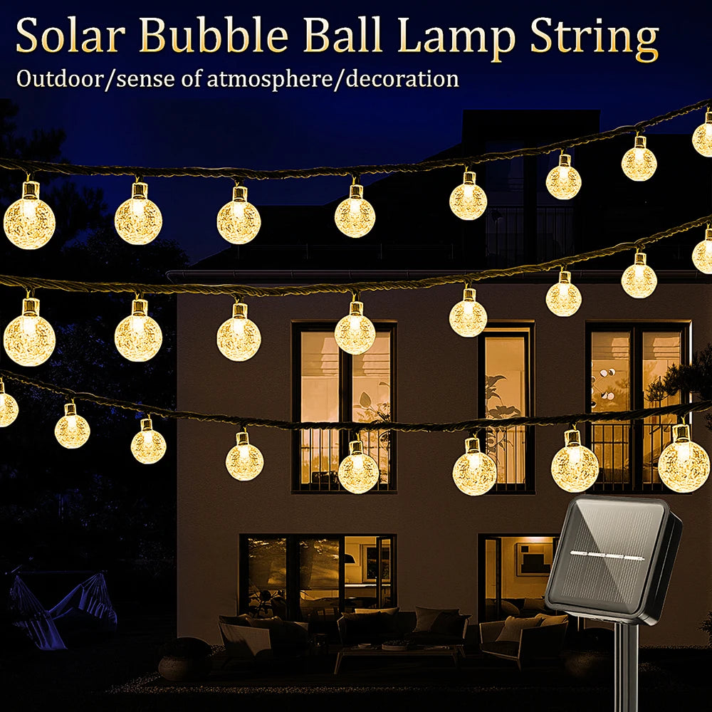 Illuminate your outdoor spaces with the enchanting glow of WELPUR Solar Bubble Ball String Lights.