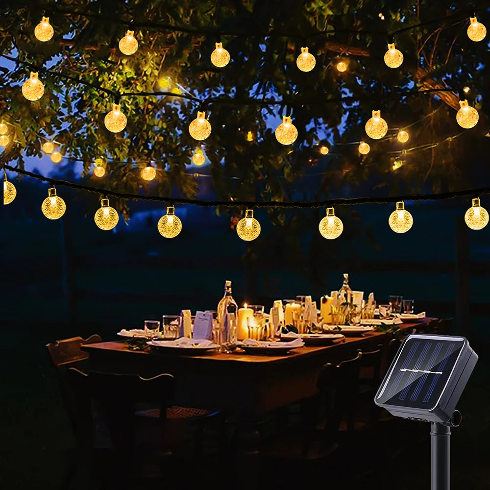 Illuminate your outdoor spaces with the enchanting glow of WELPUR Solar Bubble Ball String Lights.