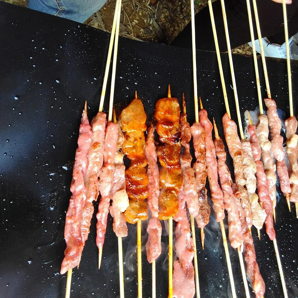 Upgrade your outdoor cooking with this reusable non-stick BBQ grill mat that keeps every dish intact, prevents messes, and makes cleanup quick, so you can focus on flavor, social grilling moments, and total outdoor enjoyment.